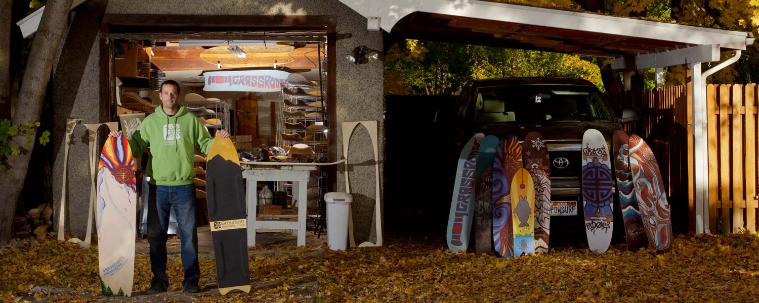 Grassroots Powdersurfing founder Jeremy Jensen stands in front of his personal powsurf factory.