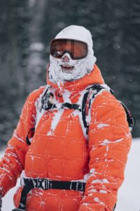 Jeremy Jensen covered in pow